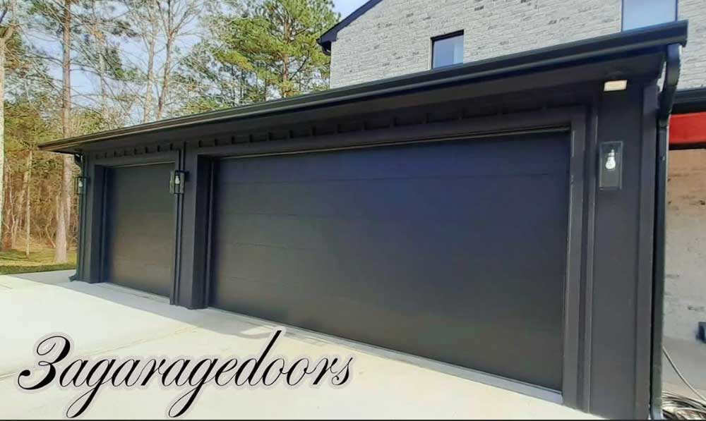 Dark modern garage doors installed by 3A Garage Doors