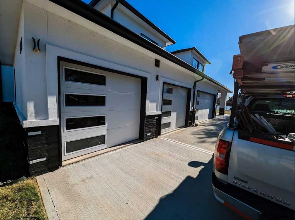 Modern glass-panel garage door installation